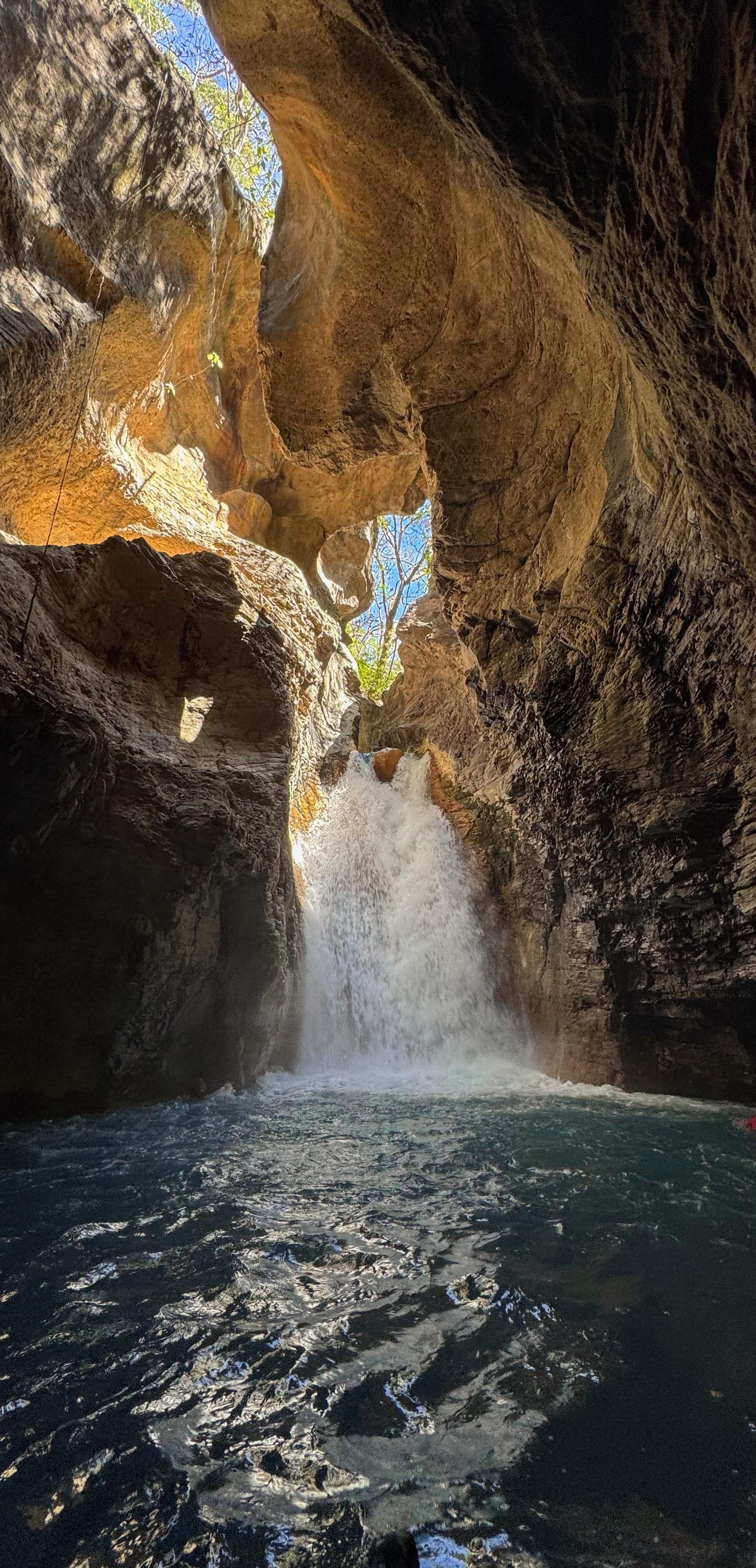 Cliff jumping at La Leona canyon, Costa Rica