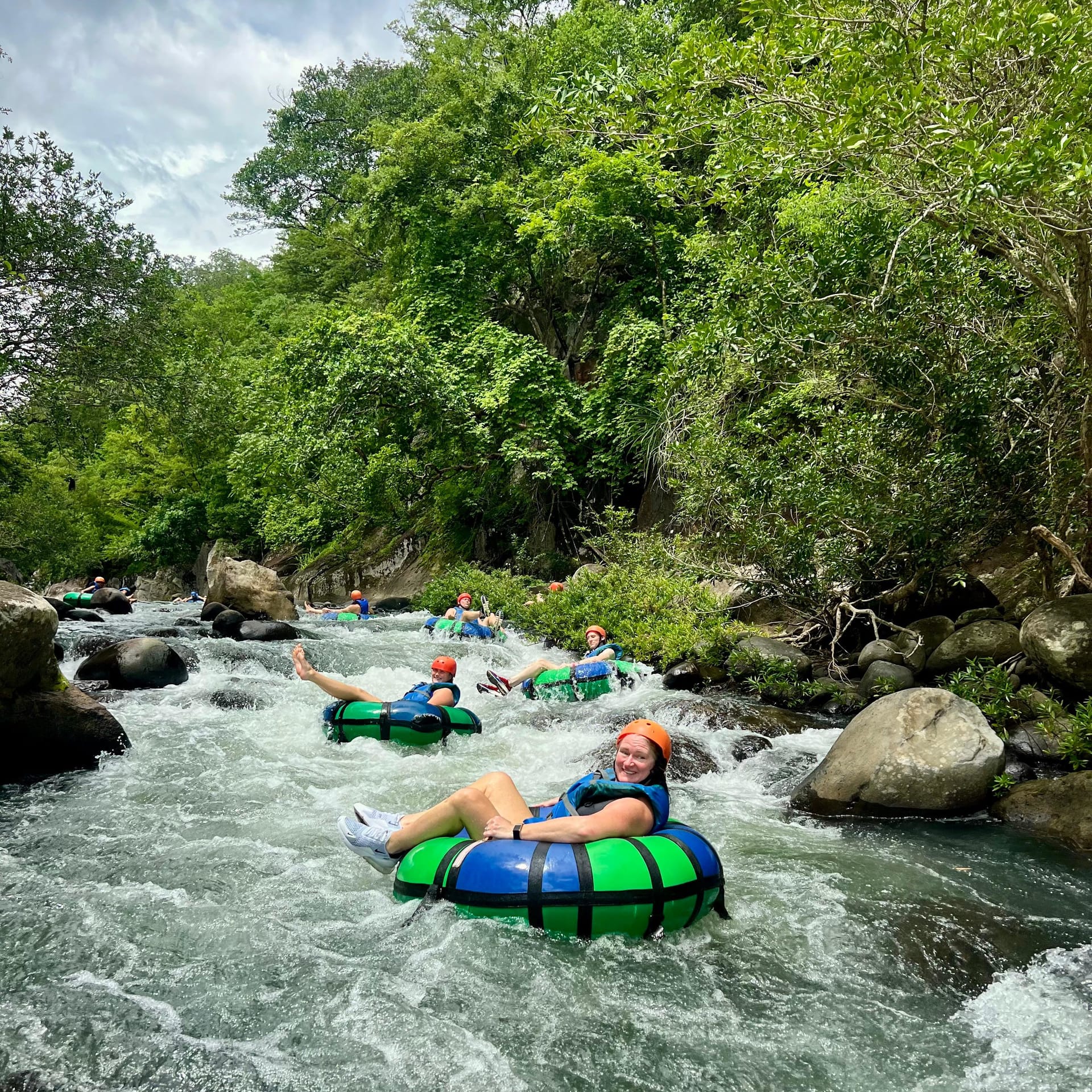 Rafters paddling through rapids on the Río Tenorio, Costa Rica adventure tour