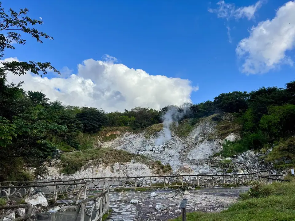 Steaming fumaroles along a wooden walkway at Las Hornillas, Miravalles Volcano